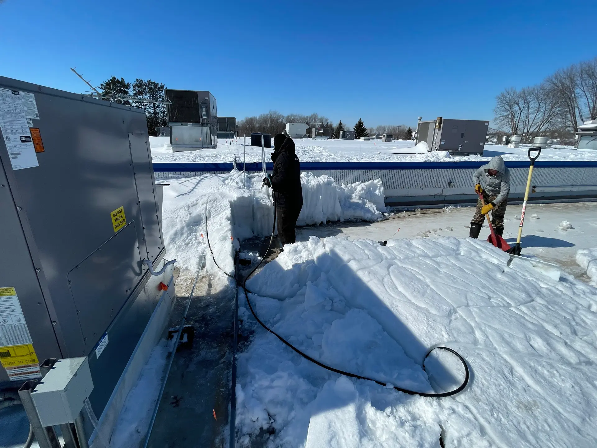 Commercial roof snow removal